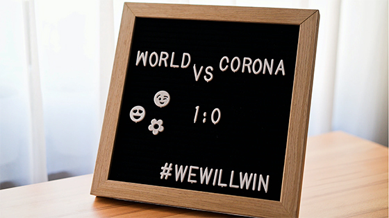a blackboard with white letters spelling "world vs. corona; 1:0; #WeWillWin," image used for a blog post about not-for-profits partnering up during COVID-19 pandemic a blackboard with white letters spelling "world vs. corona; 1:0; #WeWillWin," image used for a blog post about not-for-profits partnering up during COVID-19 pandemic