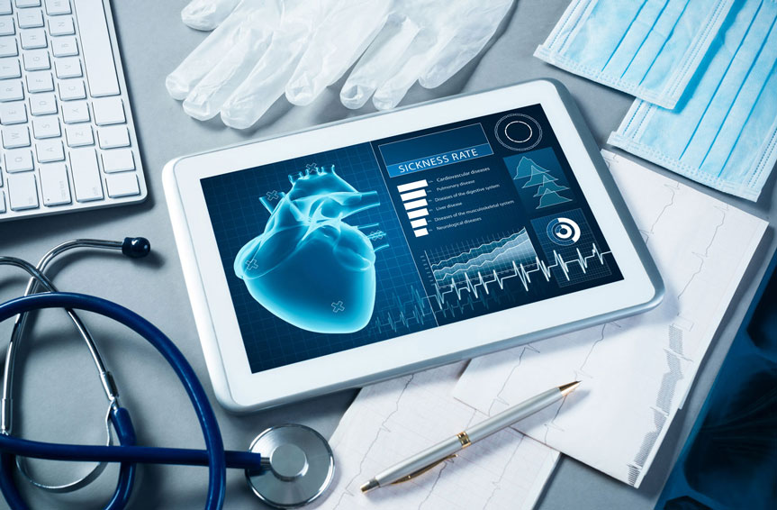stethoscope and medical items on a computer table