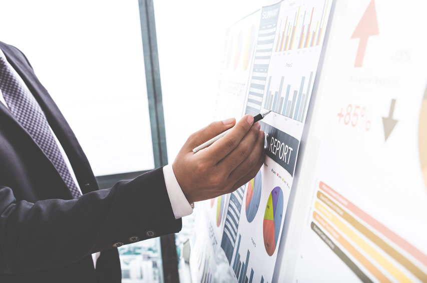 private equity fund manager presenting a report with a graph