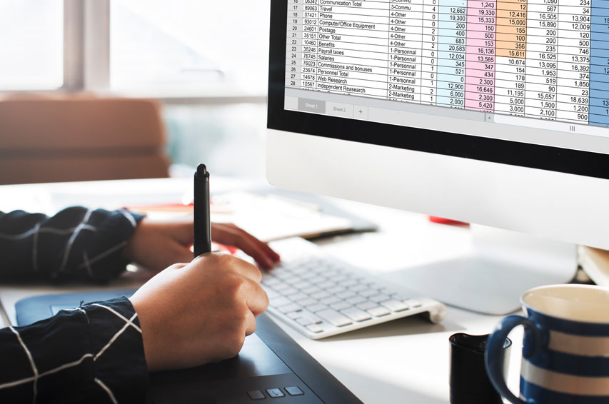 a professional designer using a creative pen tablet