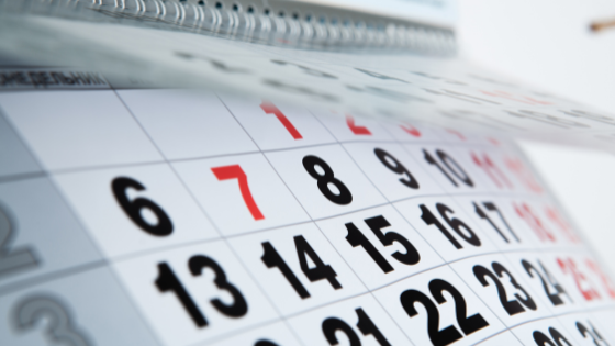 A photo of a flipping spiral calendar; image used for blog post about 2022 Q3 tax deadlines