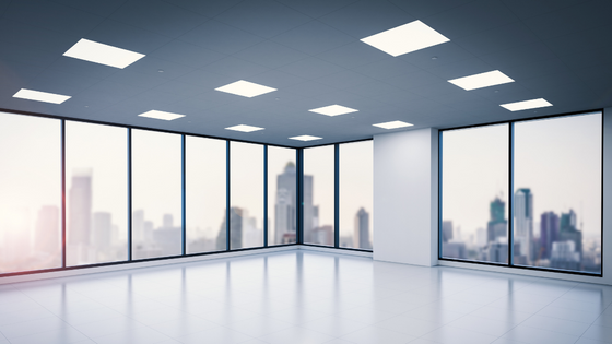 A photo of an empty office space with a window view of the city skyline; for blog post about implementing new lease standard
